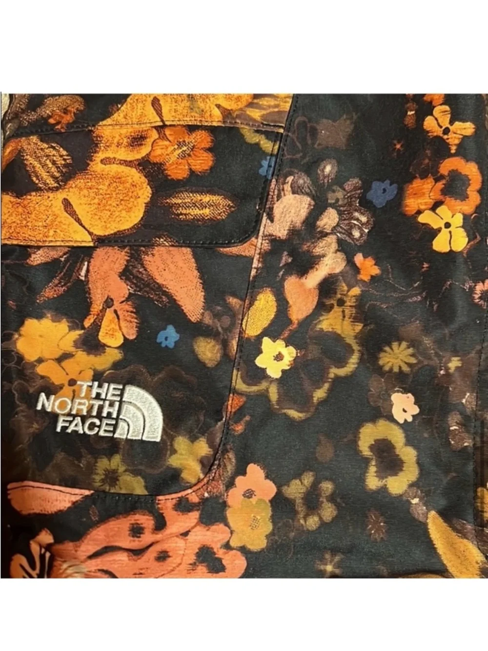 The North Face Black Floral Snow Bibs with Orange & Pink Accents - Picture 6 of 10
